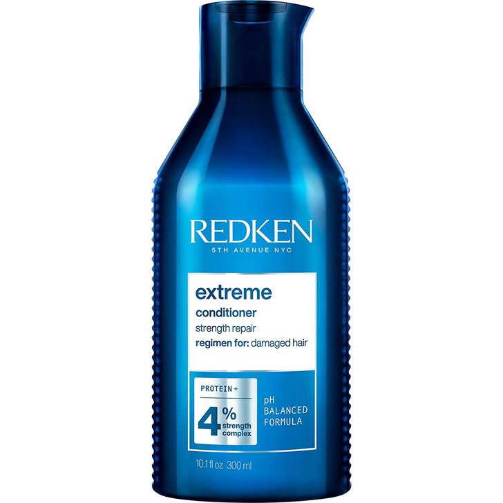 Redken extreme conditioner for strength and repair of damaged hair. Size: 10.1 fl oz / 300 ml.
